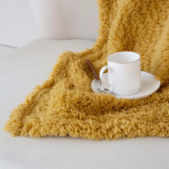 plaid decorativo para el sofá cama o para ir de viaje color mostaza