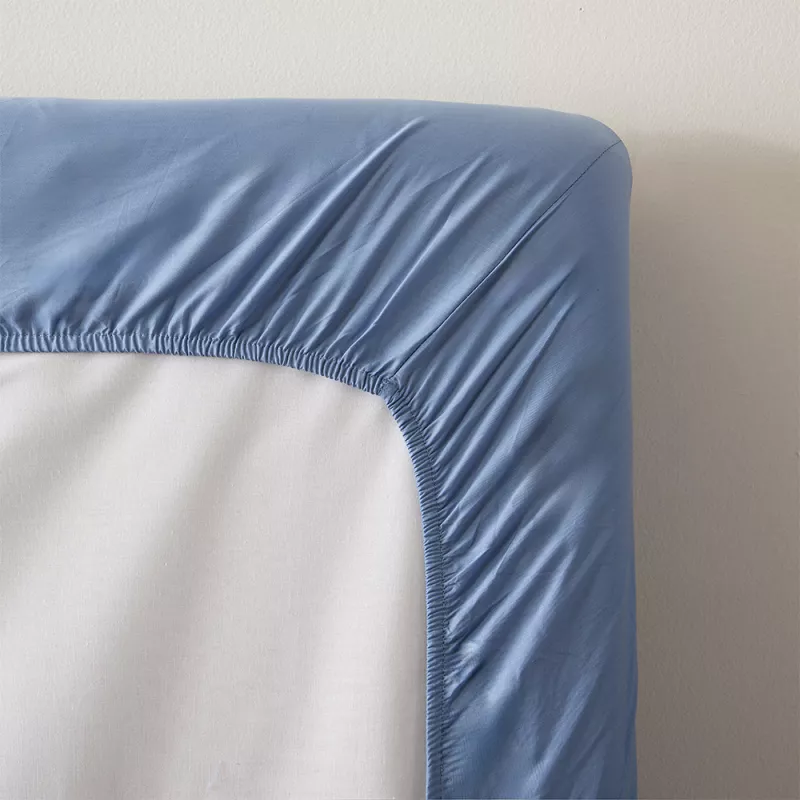 sábana bajera ajustable azul cuatro puntos ajuste